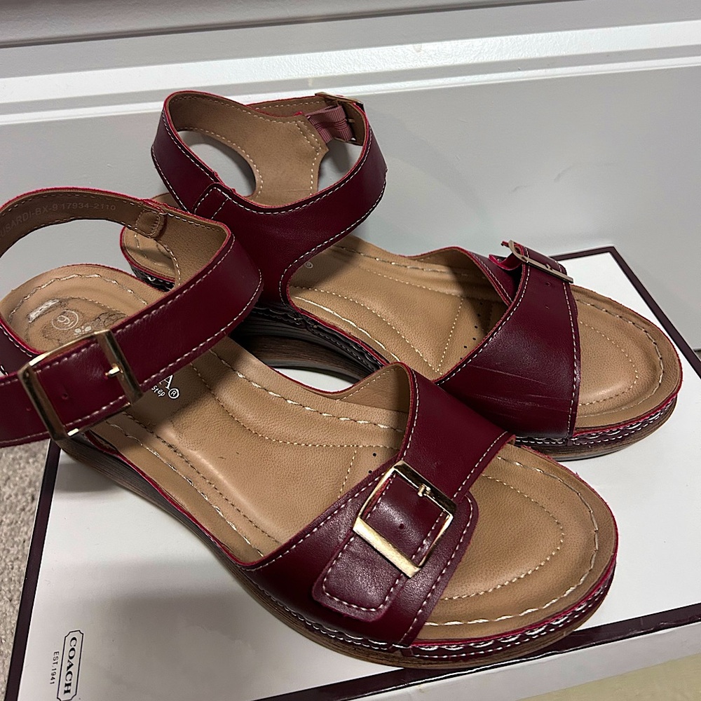 maroon wedges with buckle on ankle and front. size 9